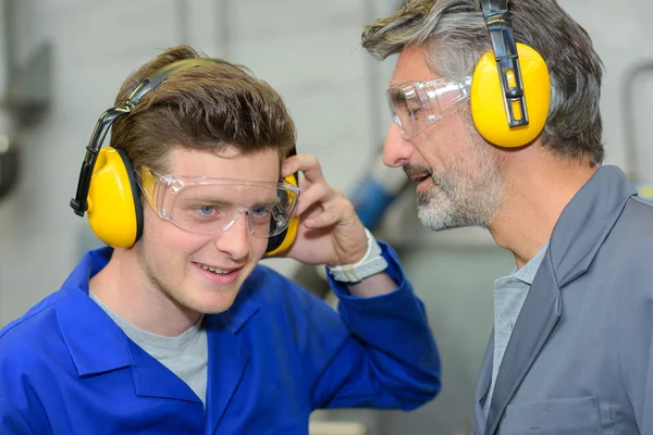 Leraar met student en volwassen — Stockfoto