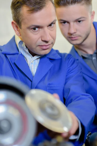 Men working with blades — Stock Photo, Image