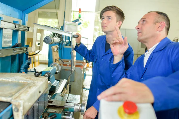 Werking van de machine en de mens — Stockfoto