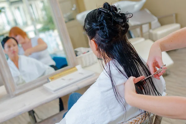 Cutting long hair and arms — Stock Photo, Image