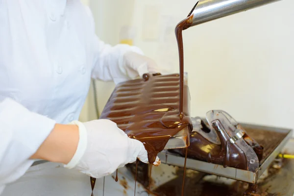 Desbordamiento de chocolate y mantener —  Fotos de Stock