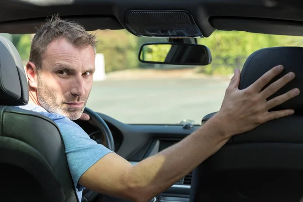 Handsome Man Driving Reverse — Stock Photo, Image