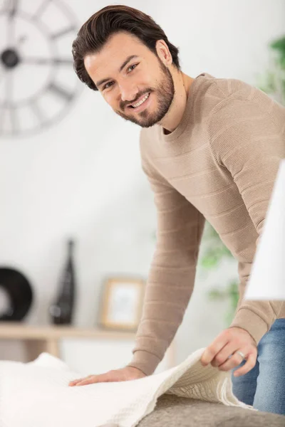 Young Man Covering Sofa Blanket — Stock Photo, Image