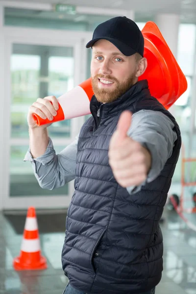 Handsome Man Thumb Carrying Traffic Cone — Stock Photo, Image