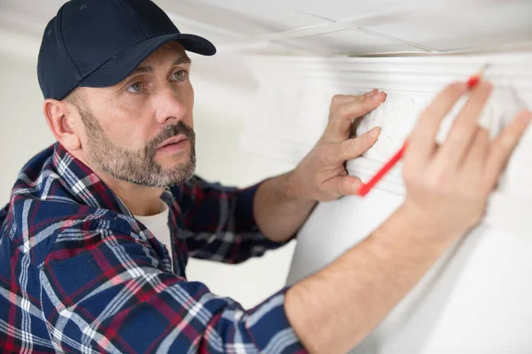 Workman Builder Marking Ceiling Pencil — Stock Photo, Image