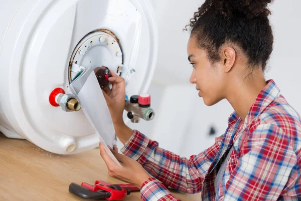 Young Woman Instructions Set Boiler — Stock Photo, Image