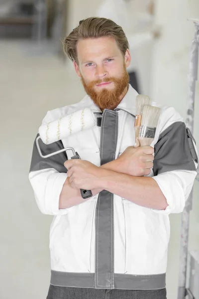 Man Painter Holding Brushes — Stock Photo, Image