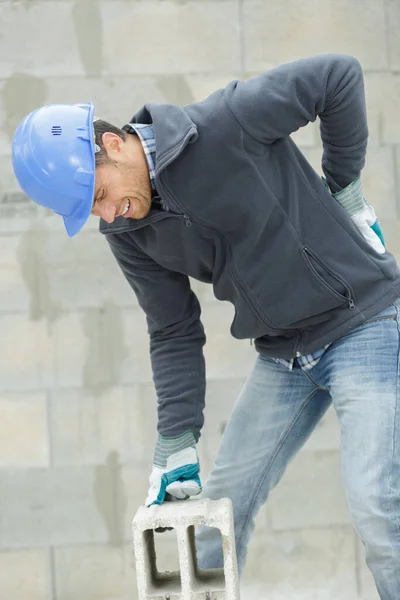 Construction Worker Getting Back Injury — Stock Photo, Image