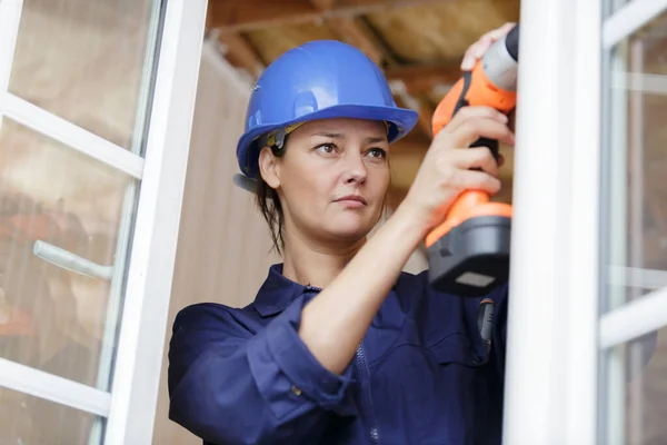 Pretty Young Woman Holding Cordless Drill — Stock Photo, Image