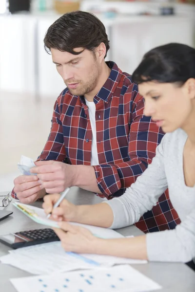 Unhappy Couple Sitting Sofa Table Bills — Stock Photo, Image