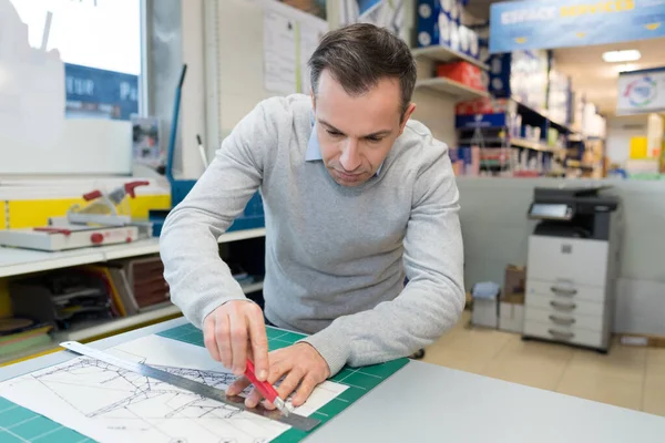 Man Cutting Out Scale Drawing Craft Knife — Stock Photo, Image