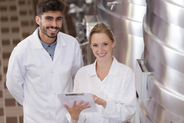 Scientist Team Metal Gauge Looking Camera — Stock Photo, Image