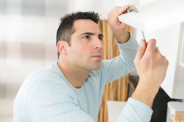 Man Fitting Cupboards — Stock Photo, Image