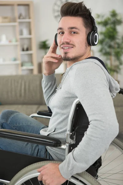 smiling handicapped man excited about new track