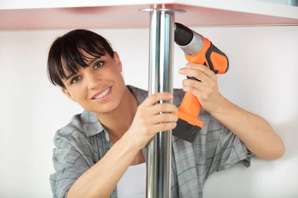 Female Worker Drilling Screws Table — Stock Photo, Image