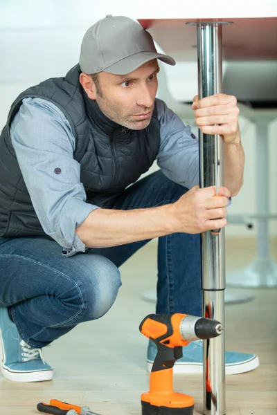 Man Repairing Furniture Home Kitchen — Stock Photo, Image