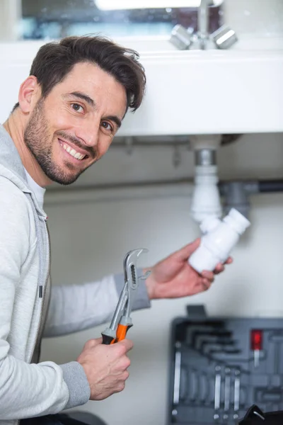 Male Plumber Fixing Sink Pipe — Stock Photo, Image