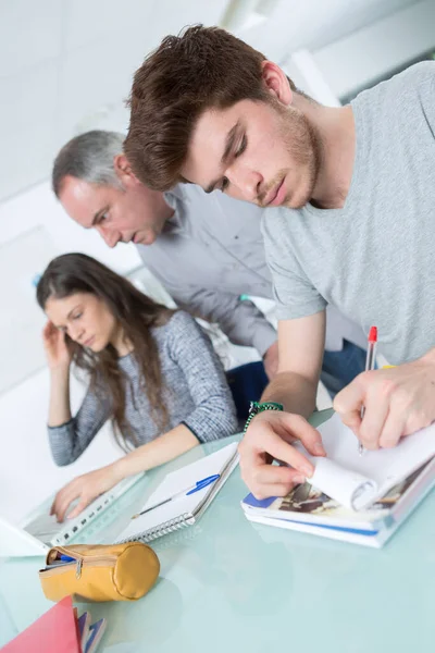 Attentive Adult Students Male Teacher Classroom — Stock Photo, Image