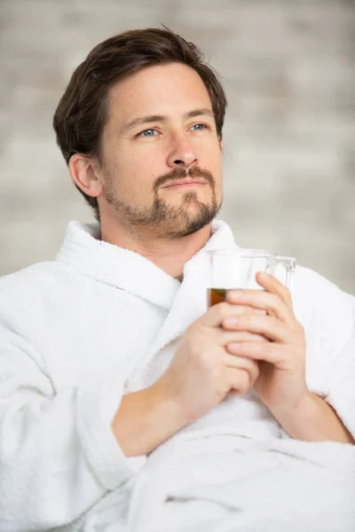 Tranquil Man Wearing Dressing Gown Drinking Tea — Stock Photo, Image