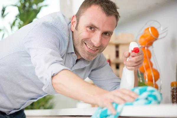 Happy Janitor Cleaning Kitchen Sink Spray Sponge — Stock Photo, Image