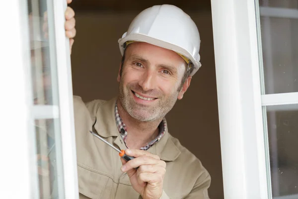 Portrait Smiling Repairman Standing Open Window — Stock Photo, Image