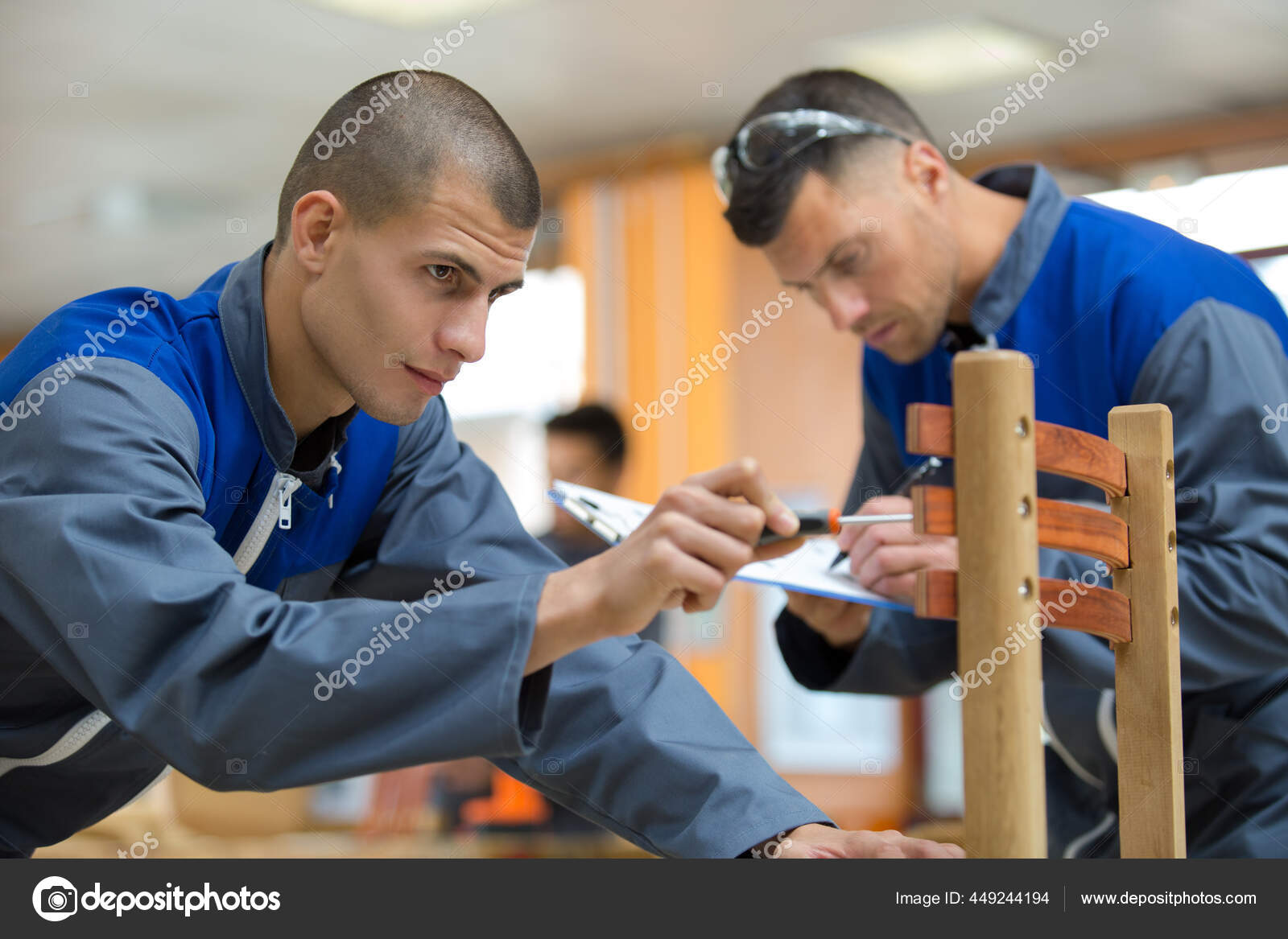 Two Men Fixing Chair Stock Photo by ©photography33 449244194