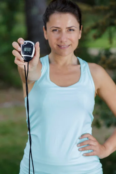 Portrait Female Athlete Showing Stopwatch — Stock Photo, Image