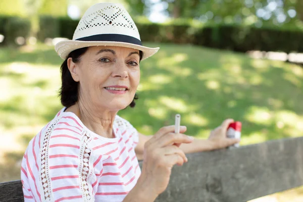 Senior Mature Woman Smoking Cigarette Park — Stock Photo, Image