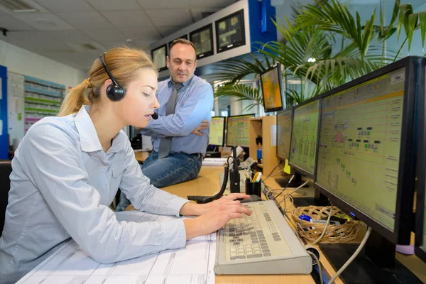 Woman Wearing Headset Typing Control Center — Stock fotografie