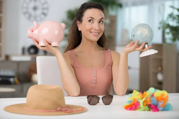 Woman Holding Globe Her Piggybank — Stockfoto