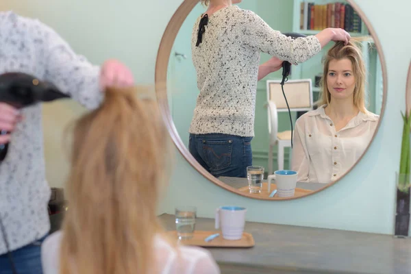 Professional Female Hairstylist Working Hair Drier — Stok fotoğraf