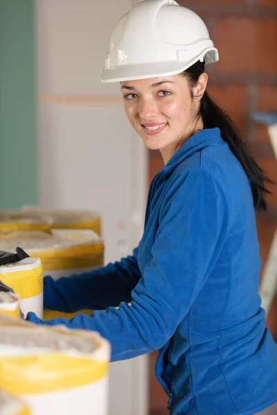 Female Worker Insulating Construction Site — Fotografia de Stock