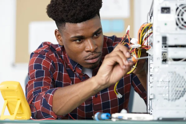 Serious Technician Fixing Computer Hardware — 스톡 사진