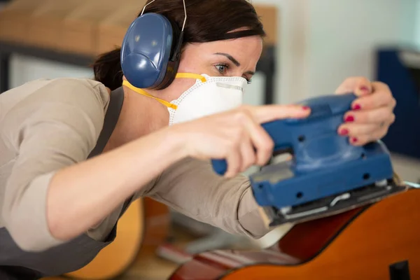 Woman Gloves Sanding Guitar — Stock Fotó