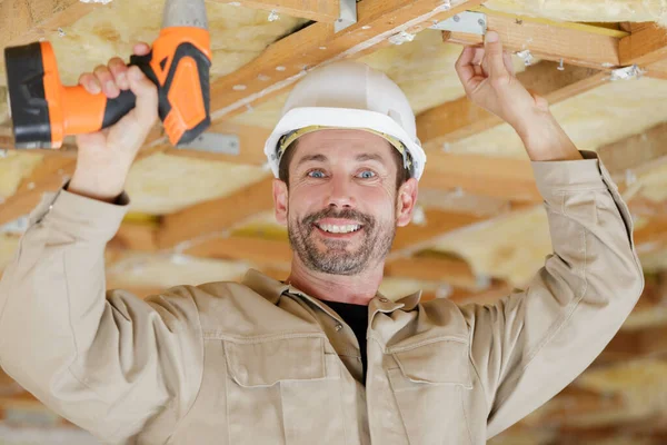 Smiling Handyman Using Cordless Drill Ceiling — Stock Photo, Image
