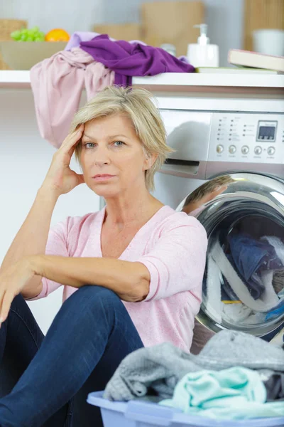 Tired Mature Woman Sat Washing Machine — Stock Photo, Image