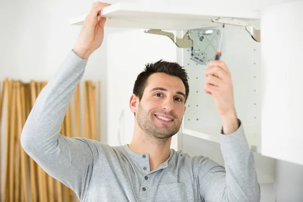 Screwing Furniture Hinge Leaf White Cabinet — Stock Photo, Image