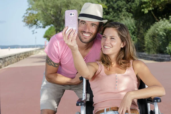 Young Couple Wheelchair Doing Selfie — Stock Photo, Image