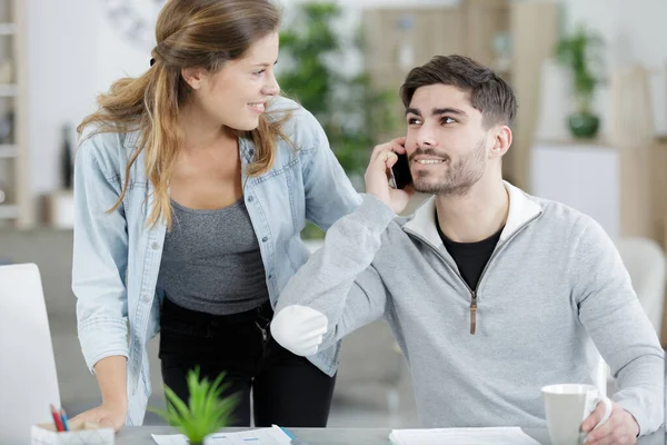 Optimistic Couple Taking Telephone Call — Foto de Stock