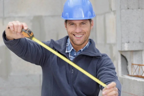 Happy Carpenter Using Tape — Stock Photo, Image