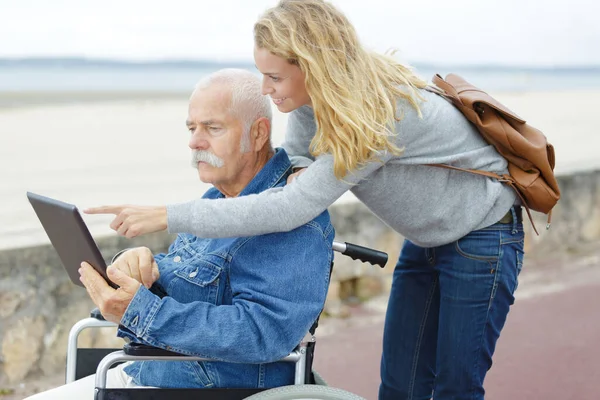 Senior Man Wheelchair Tablet Outdoors — Foto de Stock