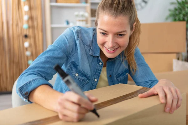 Young Woman Moving New Apartment Packing Cardboard Boxes — Stock Photo, Image