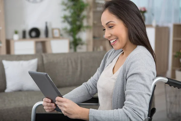 Woman Wheelchair Tablet Reading Online — Stock Photo, Image