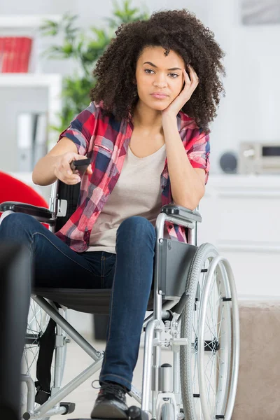 Lady Wheelchair Using Remote Control — Stock Photo, Image