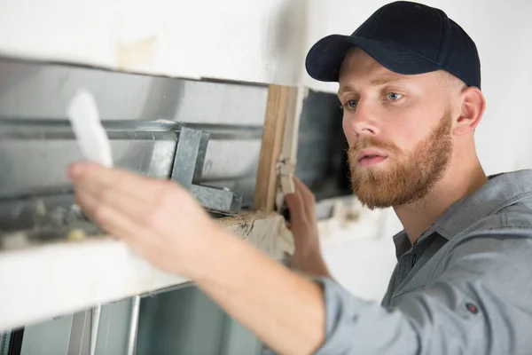 Construction Worker Repairing Window House — Stock Photo, Image