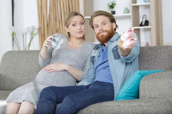 Husband Pregnant Woman Holding Baby Shoes — Stock Photo, Image