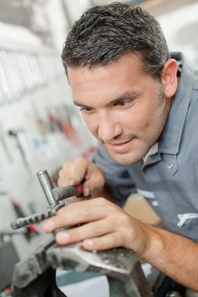 Repairing a car part — Stock Photo, Image