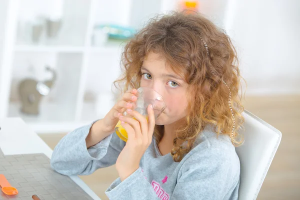 Little girl having a drink — Stock Photo, Image