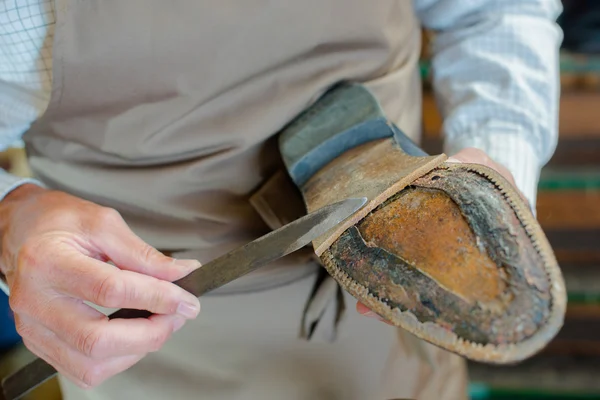 Gluing on new soles