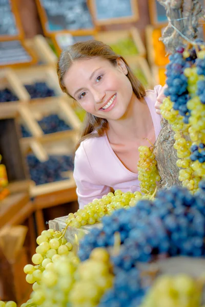 Buying some grapes Stock Photo